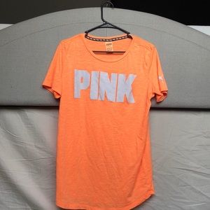 Victoria Secret’s pink t-shirt
